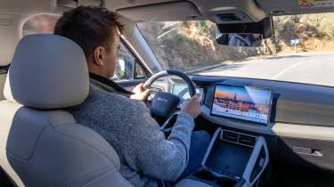 Alastair Crooks driving the BYD Atto 2 DM-i